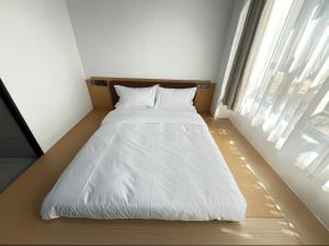 Katil atau katil-katil dalam bilik di Yunduo Jinxiu Space Capsule Hotel & Kunming South Railway Station Branch