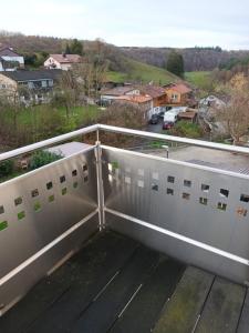 a balcony with a view of a parking lot at Herbrechtingen Eselsburg in Herbrechtingen