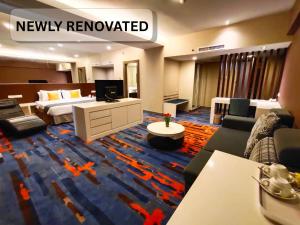 哥打京那巴鲁哥打京那巴鲁首都酒店的一间带酒店房间的房间 一间带酒店房间的房间