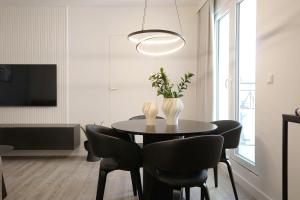 Telewizja i/lub zestaw kina domowego w obiekcie Promenada by Baltic Home