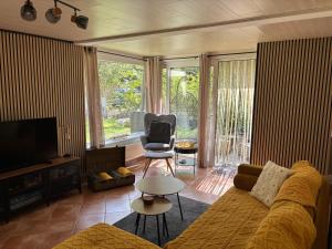Χώρος καθιστικού στο Vakantiehuis chaletje