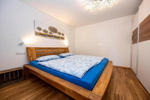 Katil atau katil-katil dalam bilik di Ferienwohnung Socher "Am Wold"