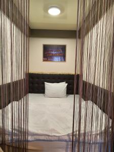 Postel nebo postele na pokoji v ubytování CosHOME - apartament