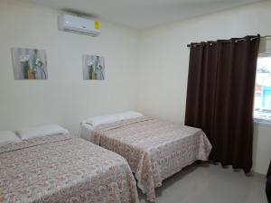 Krevet ili kreveti u jedinici u okviru objekta Maho's Apartamentos