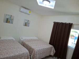 Krevet ili kreveti u jedinici u okviru objekta Maho's Apartamentos