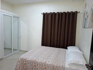 Krevet ili kreveti u jedinici u okviru objekta Maho's Apartamentos