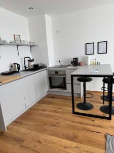 Eldhús eða eldhúskrókur á Wohnung in Graz SOVA 3
