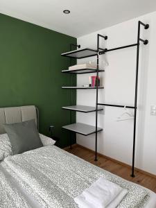 Rúm í herbergi á Wohnung in Graz SOVA 3