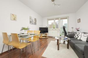 Et tv og/eller underholdning på Beautiful City Apartment by Noclegi Renters