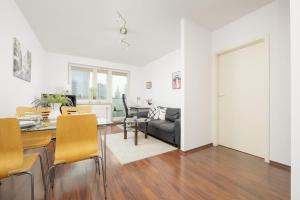 Et opholdsområde på Beautiful City Apartment by Noclegi Renters