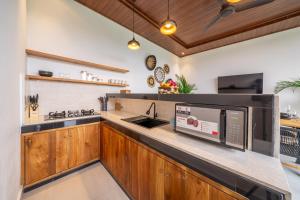 Η κουζίνα ή μικρή κουζίνα στο Nooky 4 - Relax, Recharge, Repeat - 4BDR with Spectacular Views +4 φωτογραφίες
