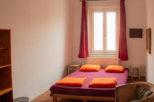 Posteľ alebo postele v izbe v ubytovaní Das Nest Budapest