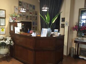 Лобби или стойка регистрации в Hotel Archimede Ortigia