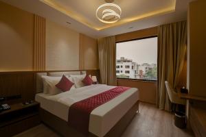 En eller flere senge i et værelse på Hotel 91 City Centre + 113 billeder