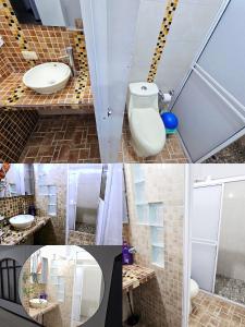 カリにあるMom's house Colombia Casa 1のトイレと洗面台付きのバスルーム