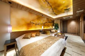 HOTEL 翠 sui -TIMELESS GARDEN-客房内的一张或多张床位