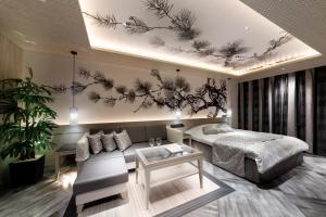 HOTEL 翠 sui -TIMELESS GARDEN-客房内的一张或多张床位
