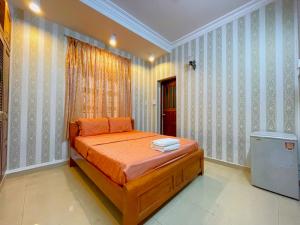 Voodi või voodid majutusasutuse Sakura Hostel Saigon toas