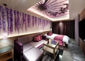 HOTEL 翠 sui -TIMELESS GARDEN-客房内的一张或多张床位