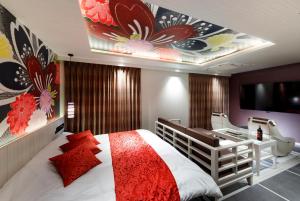 HOTEL 翠 sui -TIMELESS GARDEN-客房内的一张或多张床位