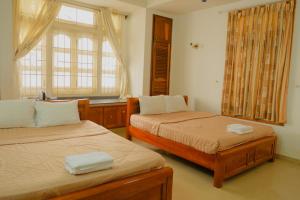 Voodi või voodid majutusasutuse Sakura Hostel Saigon toas