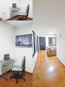 a living room with a table and chairs and a television at Mom's House Colombia Casa 2 in Cali