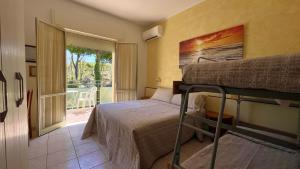 Postel nebo postele na pokoji v ubytování Hotel Zanella
