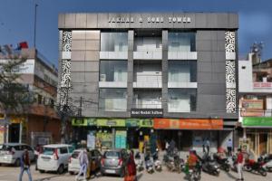 a group of motorcycles parked in front of a building at Hotel City Empire at Janakpuri " Couple Friendly" in New Delhi