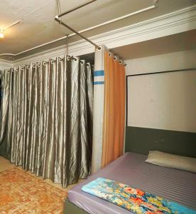 Voodi või voodid majutusasutuse Sakura Hostel Saigon toas
