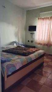 Postel nebo postele na pokoji v ubytování i2 residency