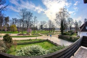 a view of a park from a fence at Appartments Eutiner Seepark in Eutin