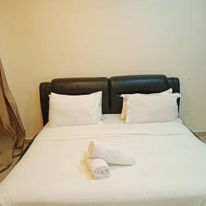 Sunsega Hotel客房内的一张或多张床位