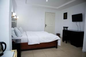 Posteľ alebo postele v izbe v ubytovaní Option one hotel and suite