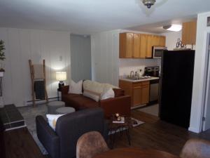 a living room with a couch and a kitchen at Blue River Condos 3 Bed 2 Bath BRLR in Blue River