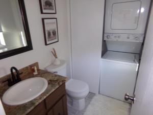 a bathroom with a white toilet and a sink at Blue River Condos 3 Bed 2 Bath BRLR in Blue River +14 photos