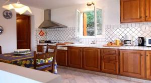 Kuchyň nebo kuchyňský kout v ubytování Villa Sirio + 11 fotografií