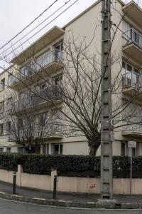a building with trees in front of it at La Nuit des Artistes - Spacious - Stade Toulousain in Toulouse