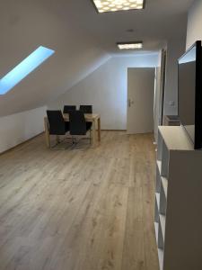Телевизор и/или развлекательный центр в Ferienwohnung Freyung, zentral, 2 Schlafzimmer