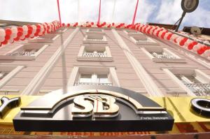 a building with a s sign in front of it at Sonerbey Otel in Ordu