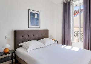 Posteľ alebo postele v izbe v ubytovaní Résidence Paris Ivry House