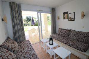 Χώρος καθιστικού στο L'Oléarias By Tranquil At Home