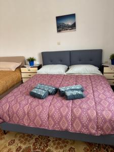 Postel nebo postele na pokoji v ubytování Aegean House