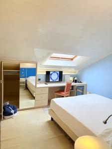 Voodi või voodid majutusasutuse Portercole B&B toas