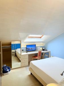 Voodi või voodid majutusasutuse Portercole B&B toas
