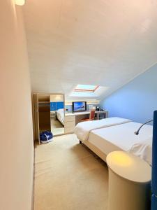 Voodi või voodid majutusasutuse Portercole B&B toas