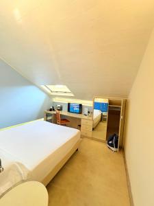 Voodi või voodid majutusasutuse Portercole B&B toas