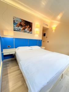 Voodi või voodid majutusasutuse Portercole B&B toas