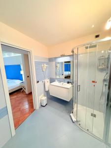 Voodi või voodid majutusasutuse Portercole B&B toas
