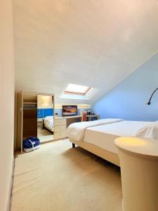 Voodi või voodid majutusasutuse Portercole B&B toas