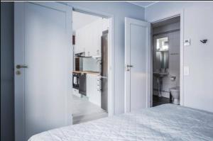 מיטה או מיטות בחדר ב-Bergsgården Lodge Järvsö - Ski In Ski Out med bastu invid Järvsöbacken - OBS!!! BYTESDAGAR ÄR ENDAST TORS O SÖND OBS!!!